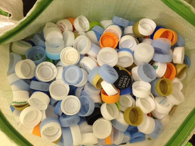 A bag of bottle caps worth one polio vaccine.