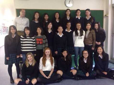 The Room to Read club that started last year, now consists of 24 members, and sponsor Mr. Gray. Photo: Mizuki