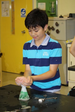Noah playing with dry ice in bubbles during Weird Science.