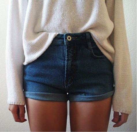 Tuck your shirt into a pair of high-waisted shorts. 