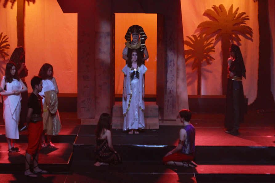 The cast rehearsing a scene from AIDA.