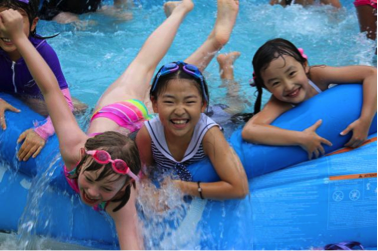 Junior school students enjoy playing in one of the three pools. 