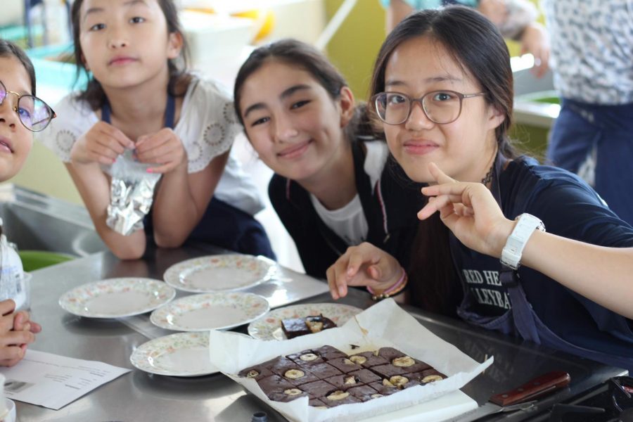 Rafaa+shares+banana+brownies+with+her+cooking+group+in+Just+Desserts.+