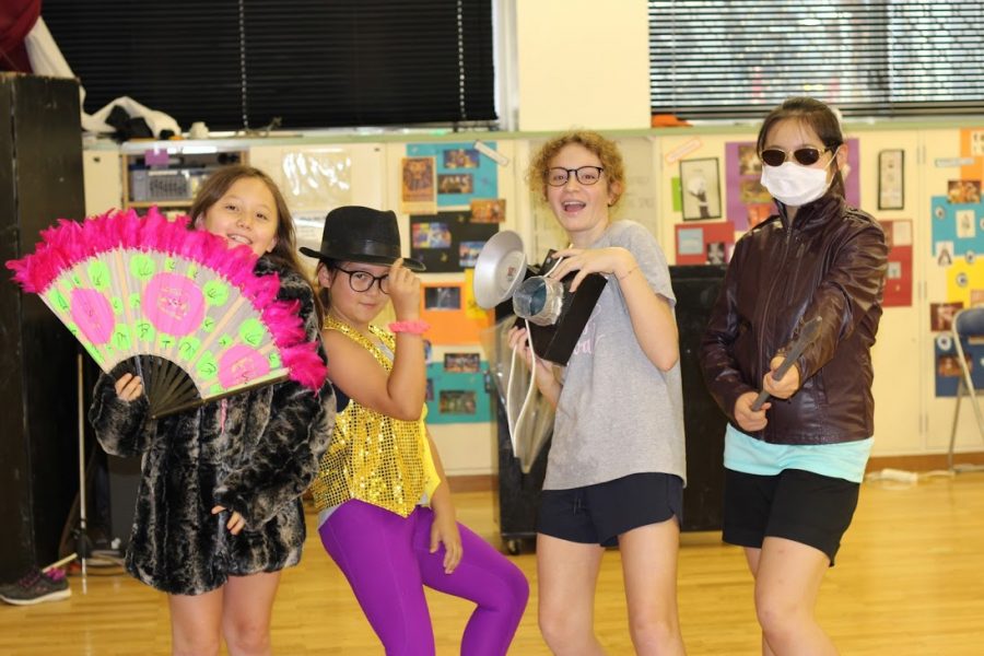 Students in the Drama course have fun with props and costumes. 