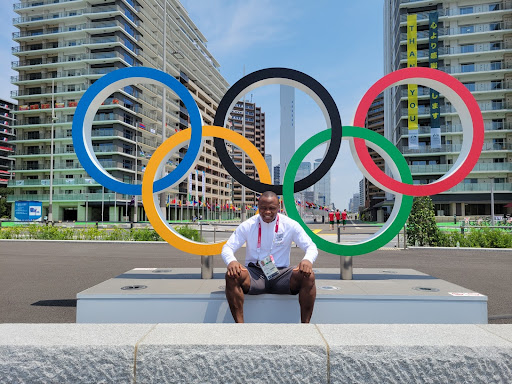 Image of the Cameroonian weightlifter Cyrille Tchatchet who competed for the Refugee Olympic Team in the 2020 Summer Olympics. 