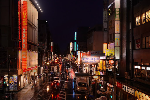 The neon-lit street of Shin-Okubo greets visitors the moment they step off the train.