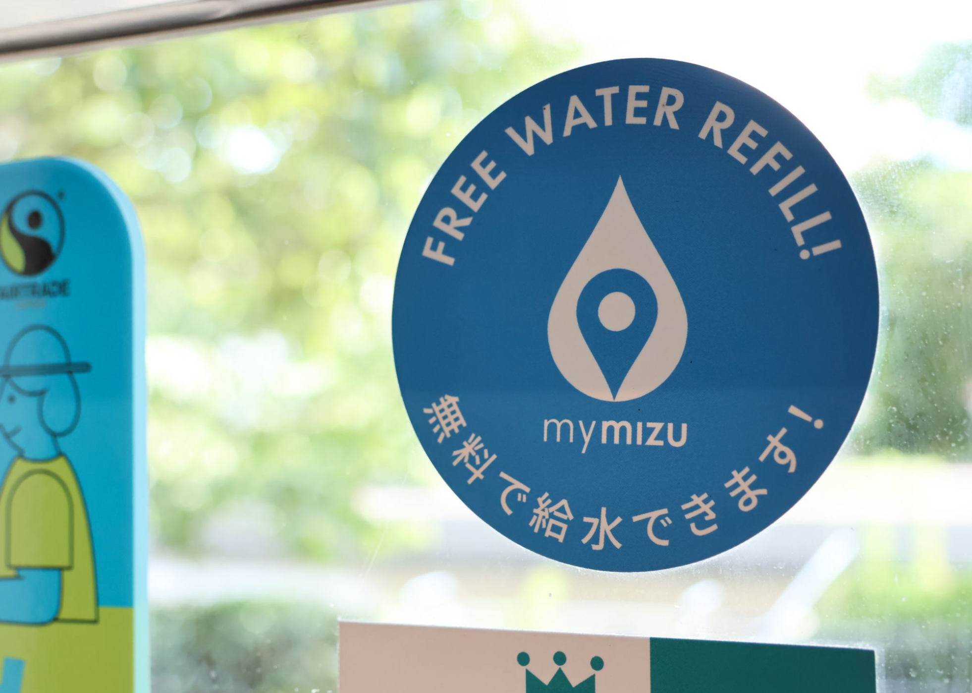 Partnered shops with mymizu provide free water refills. These partnered businesses are displayed as orange pins in the mymizu application, blue for public drinking fountains, and navy for natural spring waters. Partnered businesses generally display an indication, such as stickers, to promote sustainability. Credit: mymizu